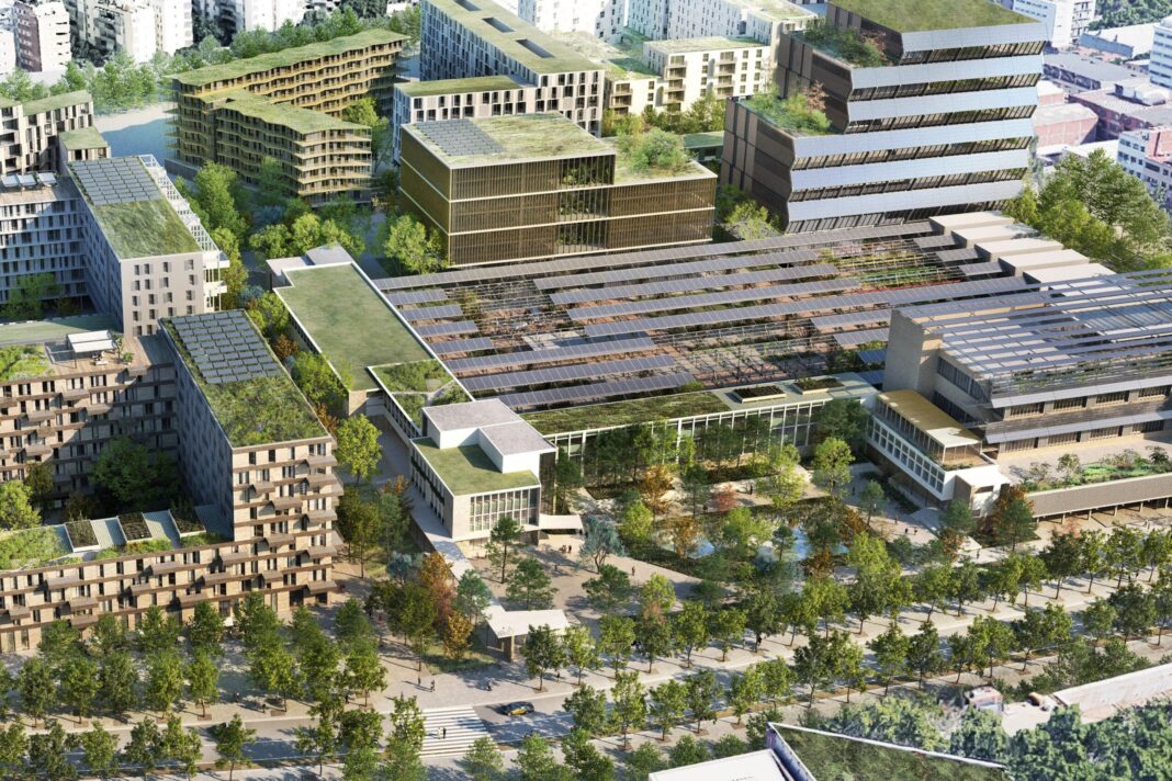 Recreació aèria del projecte als terrenys de l’antiga fàbrica Mercedes-Benz al Bon Pastor, amb nous edificis, cobertes verdes i espais arbrats.